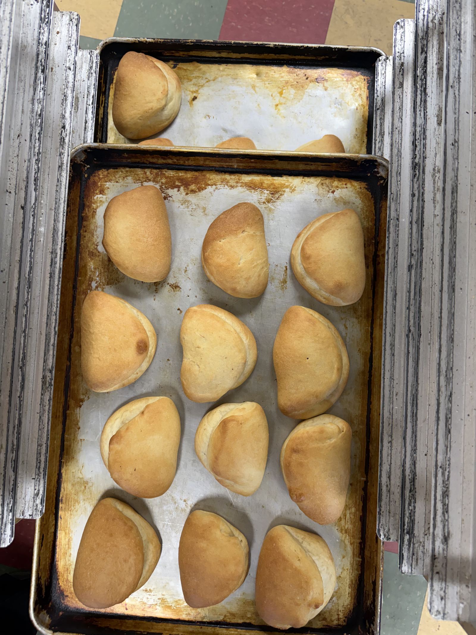 Trays of golden bread rolls